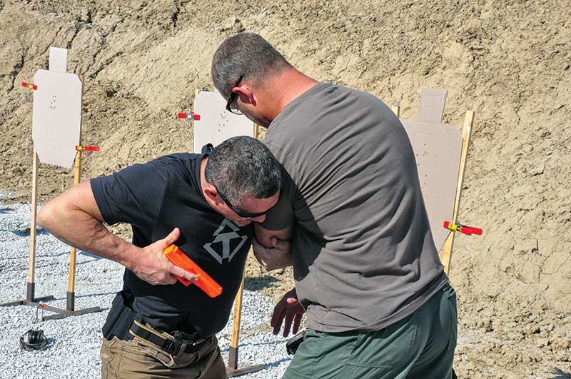 Thumb-pectoral index, the author's prefered position for shooting from retention.